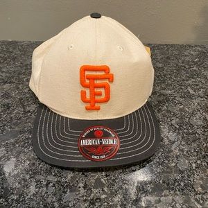 American Needle Cream and Black Hat with Bold Orange Logo